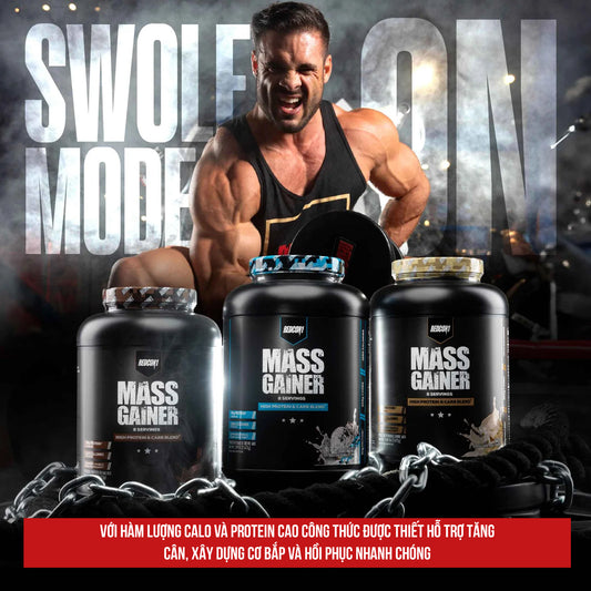 Muscular man with mass gainer supplements in a gym setting